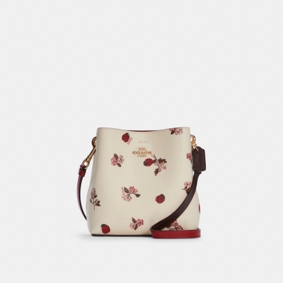 Coach - Small town bucket bag Lady bug floral print